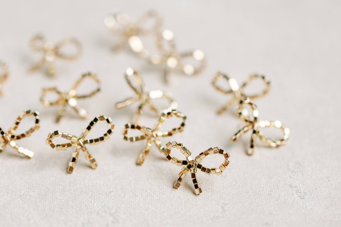Mini Gold Beaded Bow Earrings