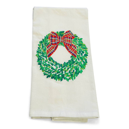 Boxwood Wreath with Red Bow on White Cotton Towel